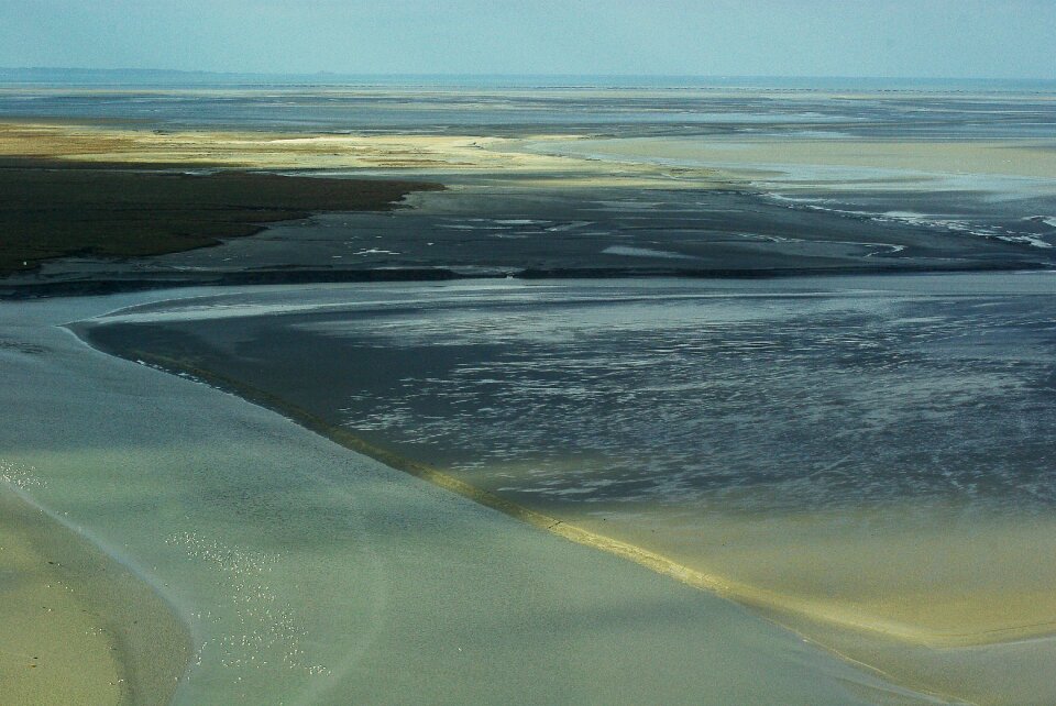 Normandy mont saint michel low tide