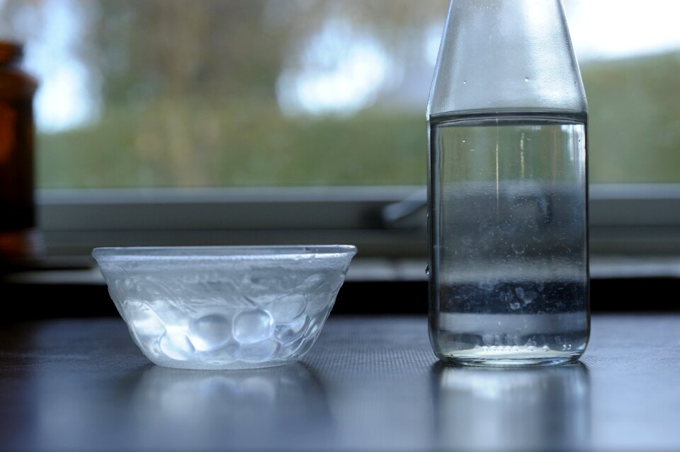 Bowl and bottle water on the table drinking water