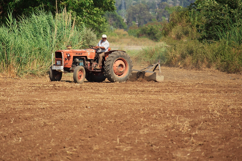 Driving farm farmer