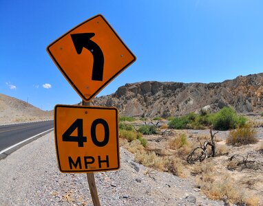 Road road sign desert photo