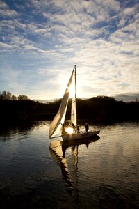Sun water sailboat photo