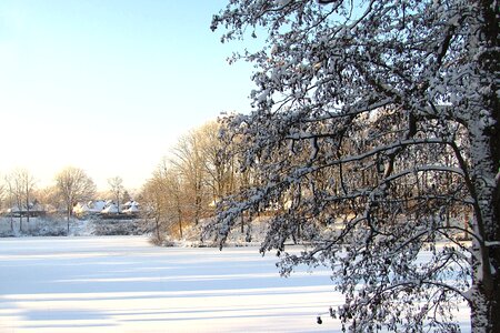 Snow lake sun photo