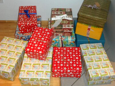 Christmas in a shoe box packed wrapping paper photo