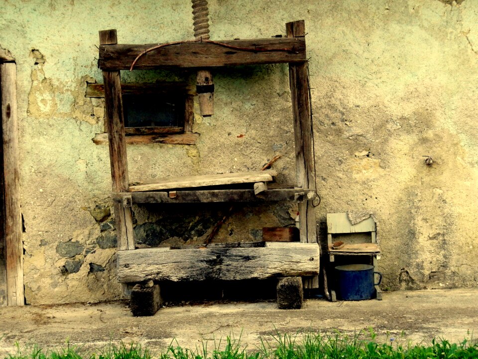 Wine press metal bucket old wood