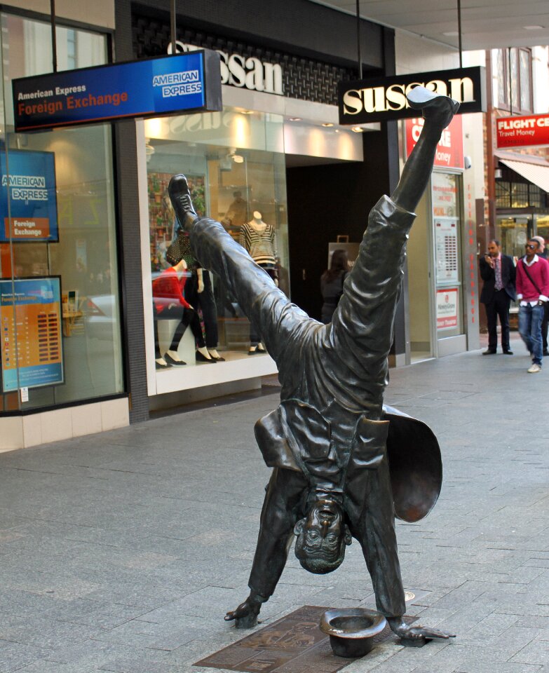Human handstand bronze sculpture