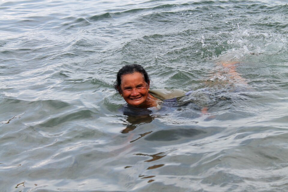 Happy women swimming