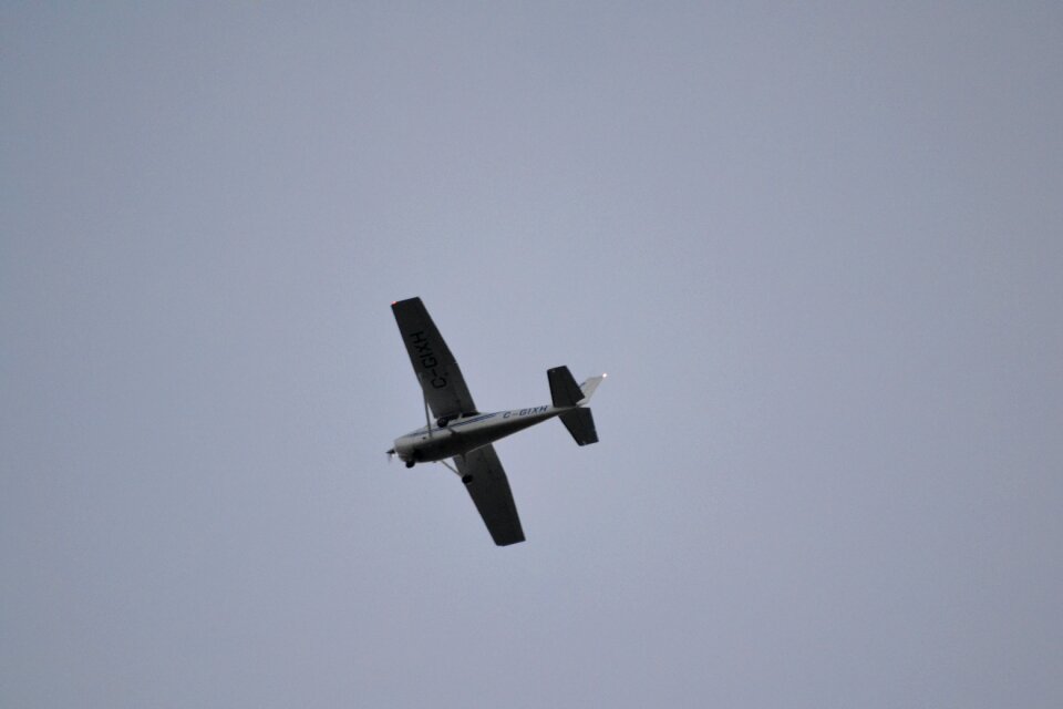 Aircraft grey sky small plane