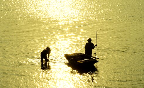 Catching fish sunset gold