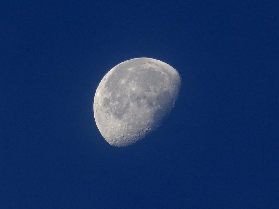 Day half moon sky blue