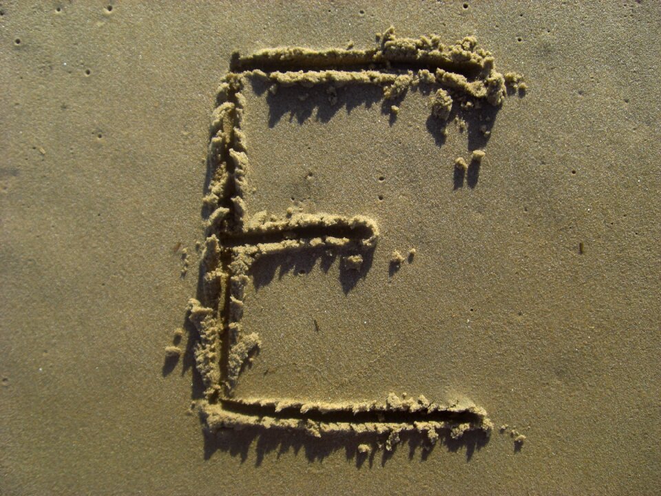 Beach alphabet brown letter