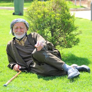 Old muslim smoking
