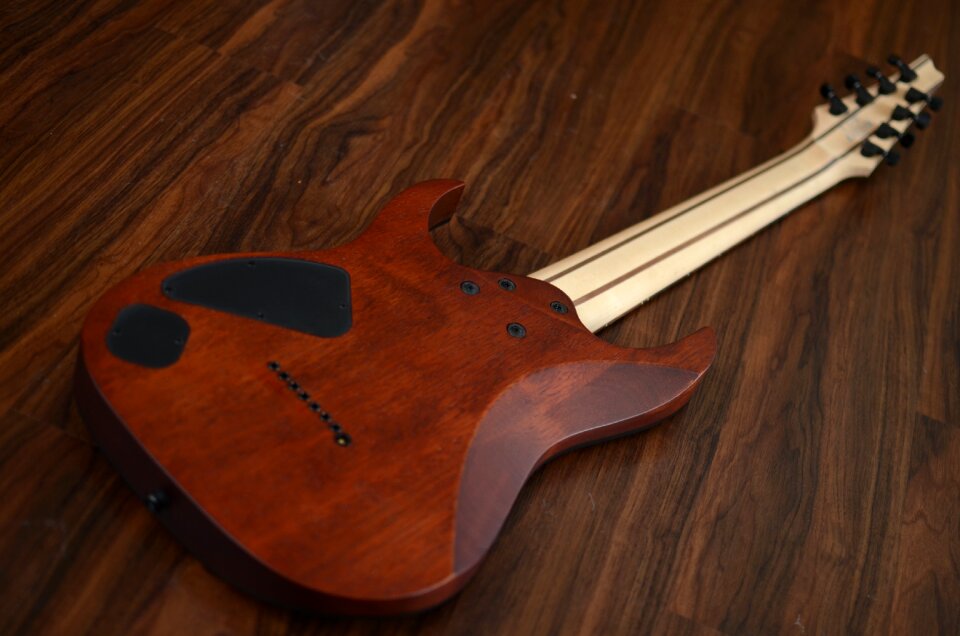 Blue back brown guitar