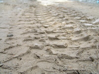 Tire tracks sand site photo