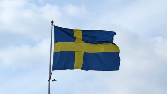 Blue-and-yellow swedish flag cloud photo