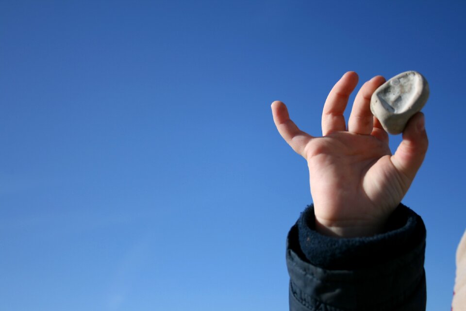 Sky blue hand holding