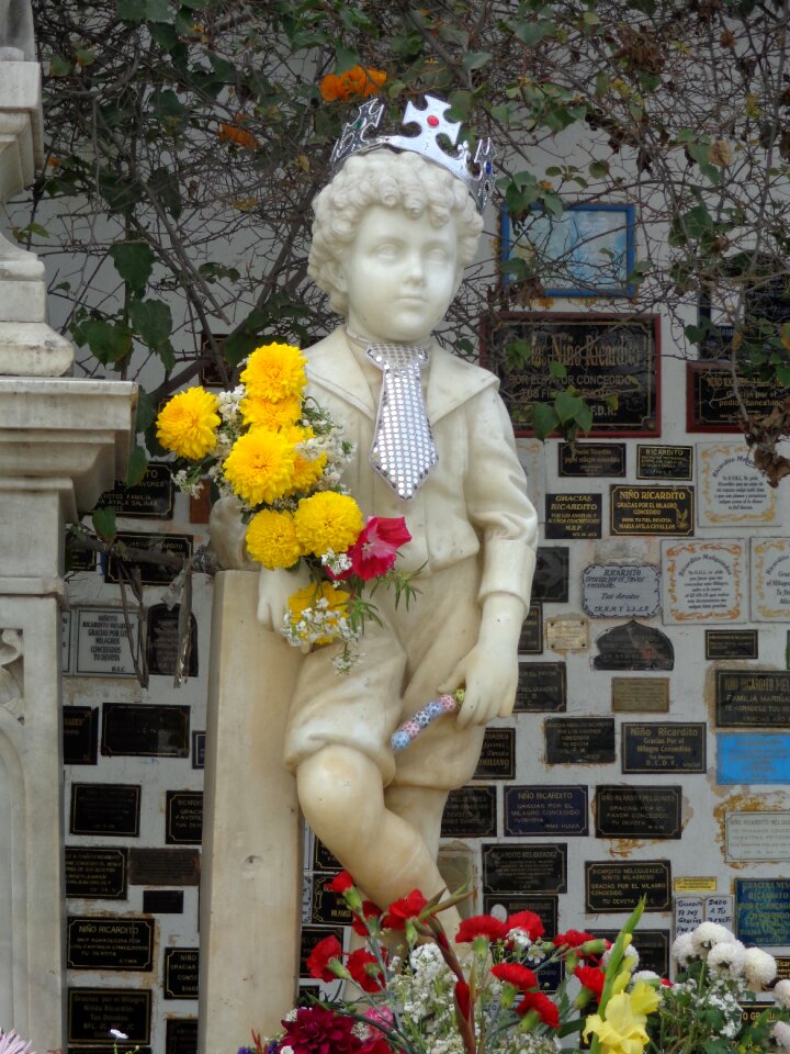 Priest cemetery child