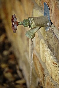 Winter drip faucet spigot photo