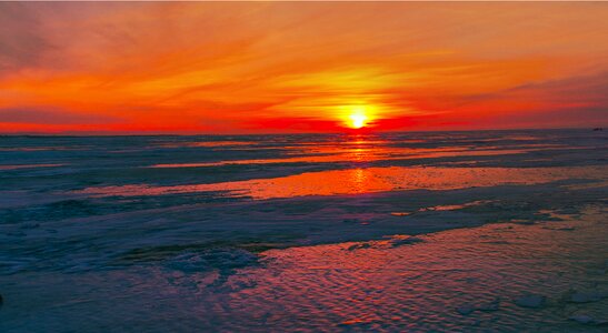 Sunset on lake baikal winter ice