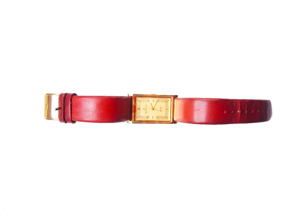 Strap gold dial white background