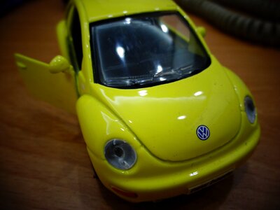 Toy car yellow mini car photo