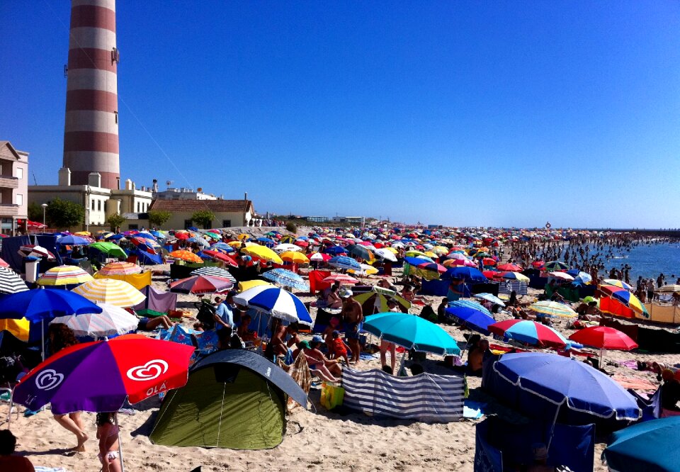 A bar umbrellas sand
