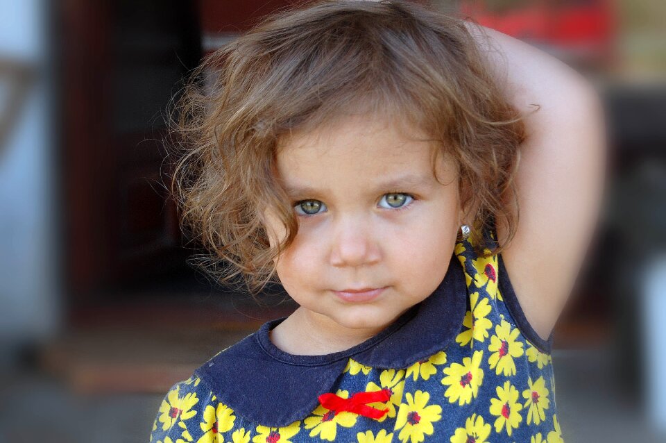 Curly hair green eyes portrait