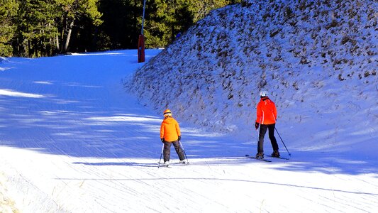 Skiers skiing snow photo