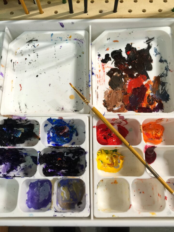 Brush and paints bright colors