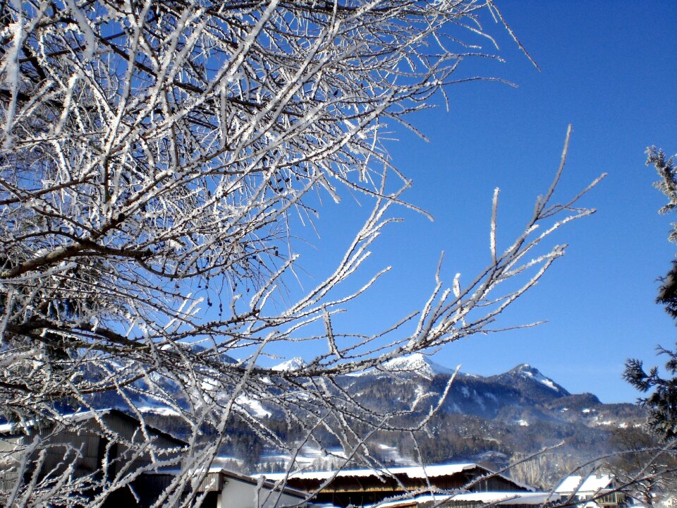 Mountains snowy village scene winter photo