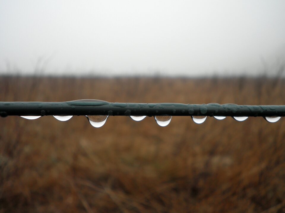 Close up drop of water metal