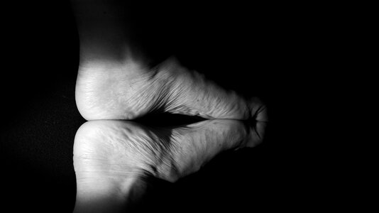 Black and white kissing toes