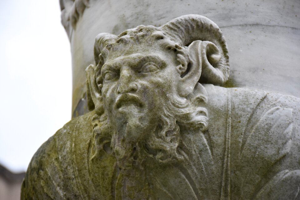 Bas-relief carving greek god