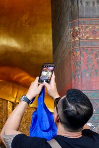 Mobile phone selfi buddhism photo