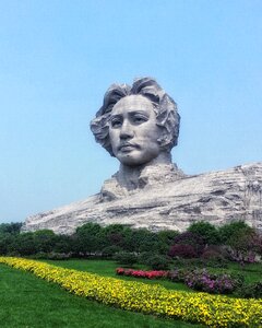 Orange island head sculpture photo