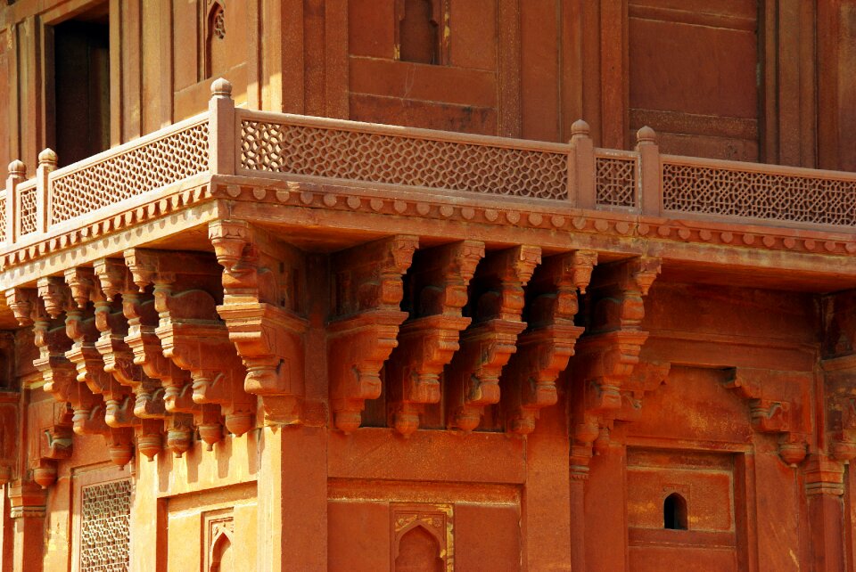 Architecture stone lace balcony photo