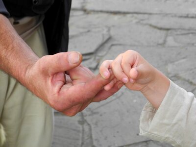 Human hands young and old trust