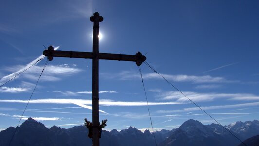 Cross alpine mountains photo