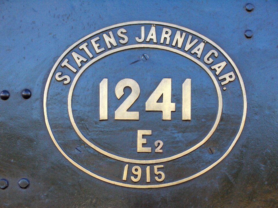 Steam locomotive shield brass