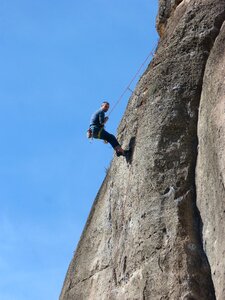 Rock wall escalation harness