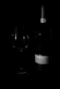 Low key dark black wine photo