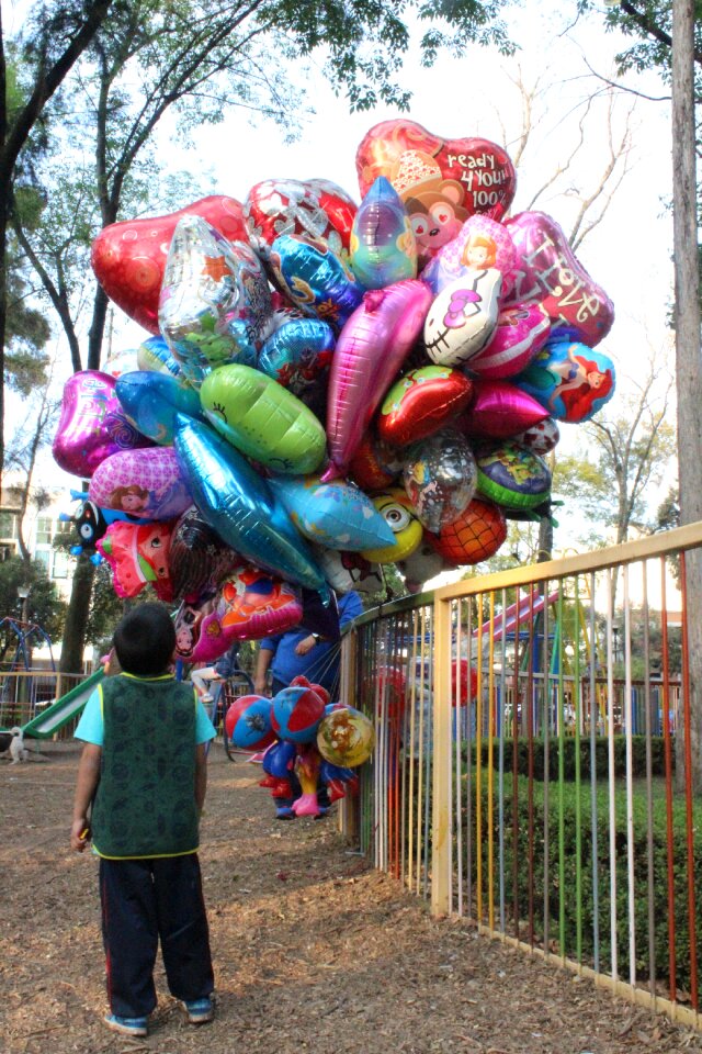 Child balloons fun