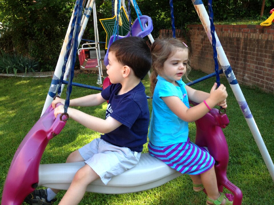 Playground swinging