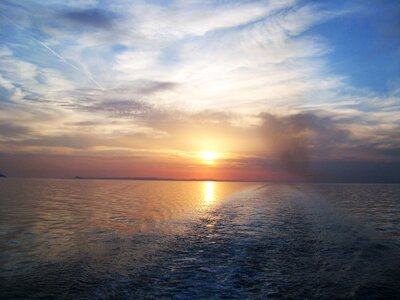 Evening sun sunset on the sea photo