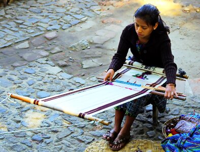Weaver crafts weaving