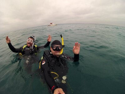 Divers open water taking picture photo