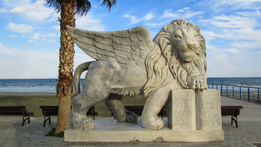 Winged lion statue photo