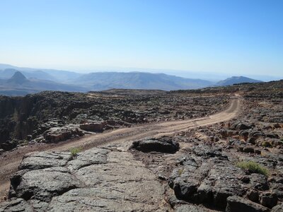 Loneliness desert road road dust photo
