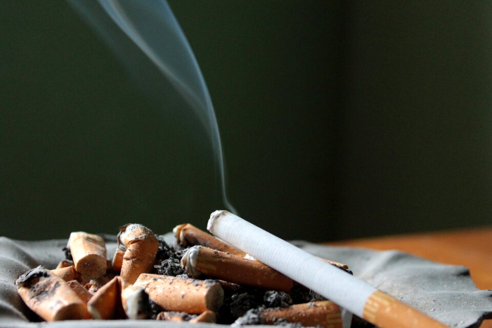 Smoking tilt cigarette butts