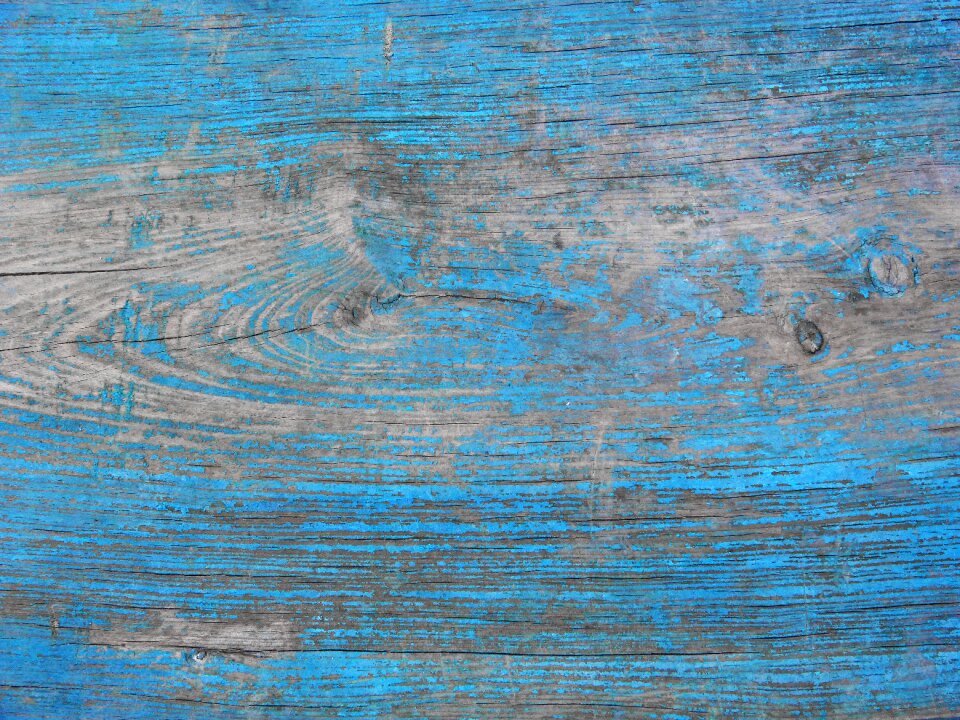 Wood peeling paint blue