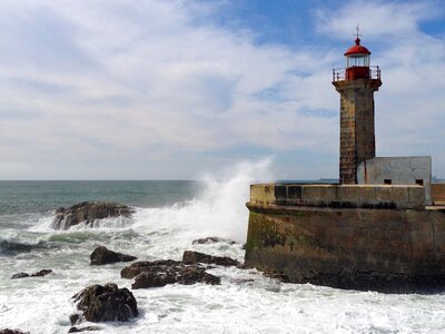 Sea lighthouse wind photo